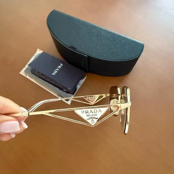 Prada Women's Sunglasses with Gold Frame and Grey Lenses - Picture 2 of 4